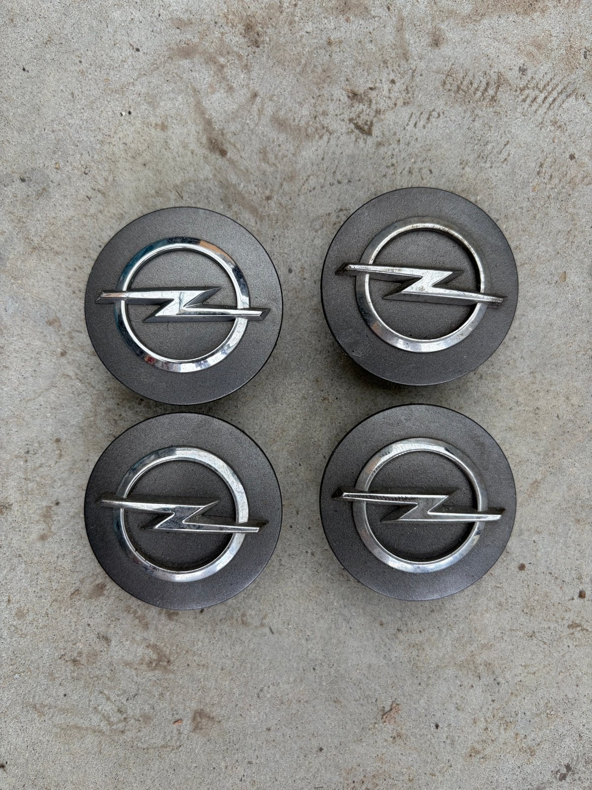 Set van 4 Opel naafdoppen - Gebruikt, Auto diversen, Wieldoppen, Ophalen of Verzenden, Gebruikt