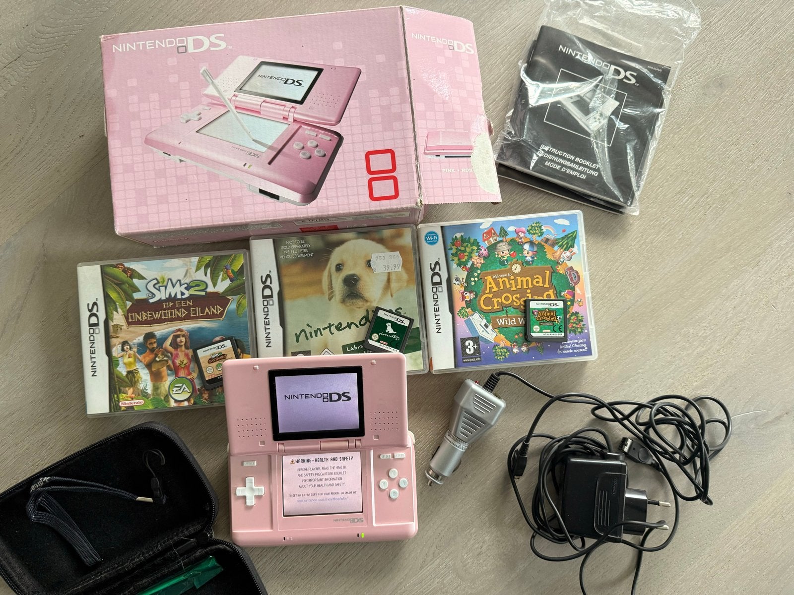 Nintendo DS Phat Roze met 3 spellen en accessoires, Spelcomputers en Games, DS Original of Phat, Ophalen of Verzenden, Roze, Gebruikt