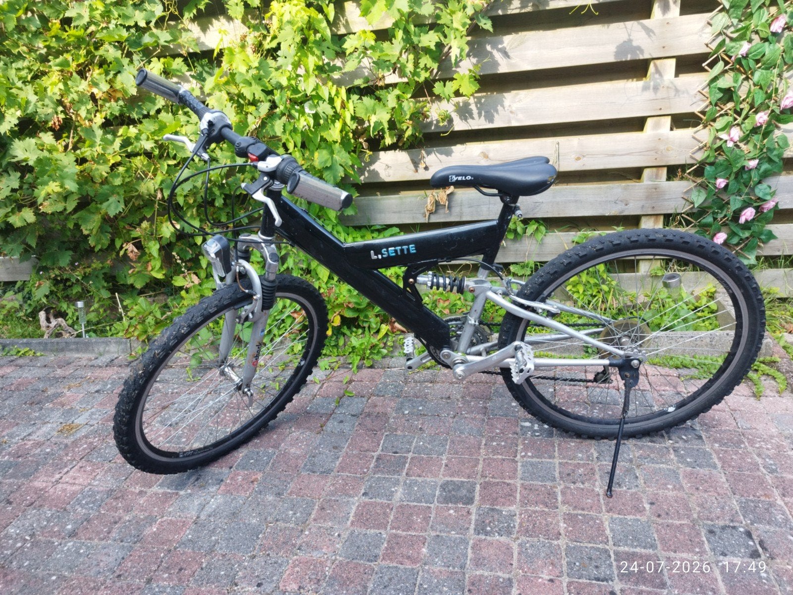 Zwarte mountainbike met vering - Gebruikt, Fietsen en Brommers, Fietsen | Mountainbikes en ATB, Gebruikt, Fully, Dames, Schijfrem