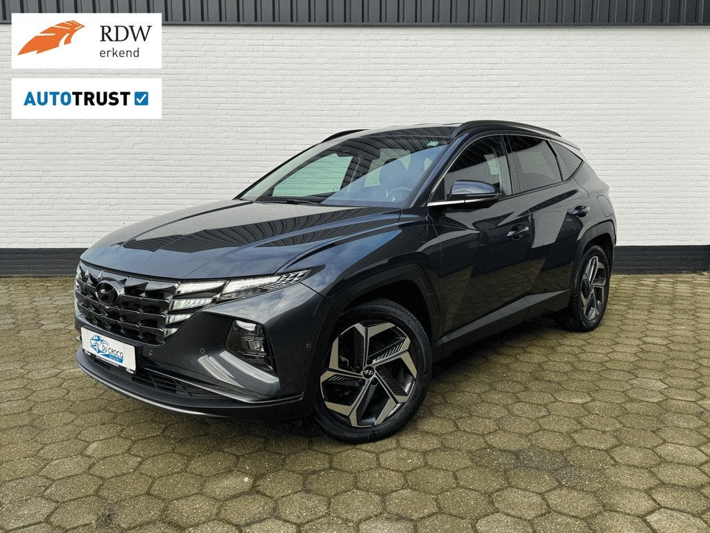 Hyundai TUCSON 1.6 T-GDI PHEV Premium 4WD l LEDER l TREKHAAK, Auto's, Hyundai, Automaat, 1350 kg, Gebruikt, 4 cilinders