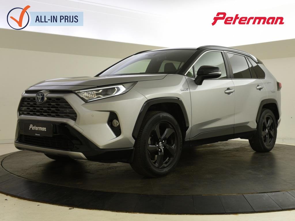 Toyota RAV4 2.5 Hybrid AWD Style Bi-tone | Halfleer | PDC |, Auto's, Automaat, 12 maanden, Gebruikt, 1650 kg