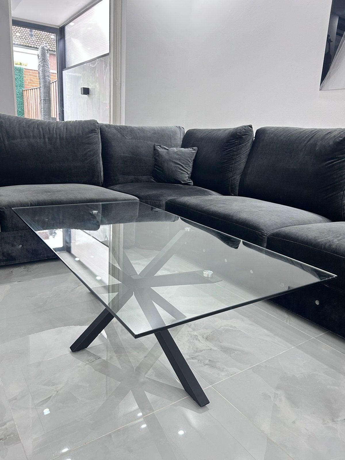Goossens glazen salontafel met zwarte aluminium poten, Ophalen, Gebruikt, 100 tot 150 cm, 50 tot 100 cm