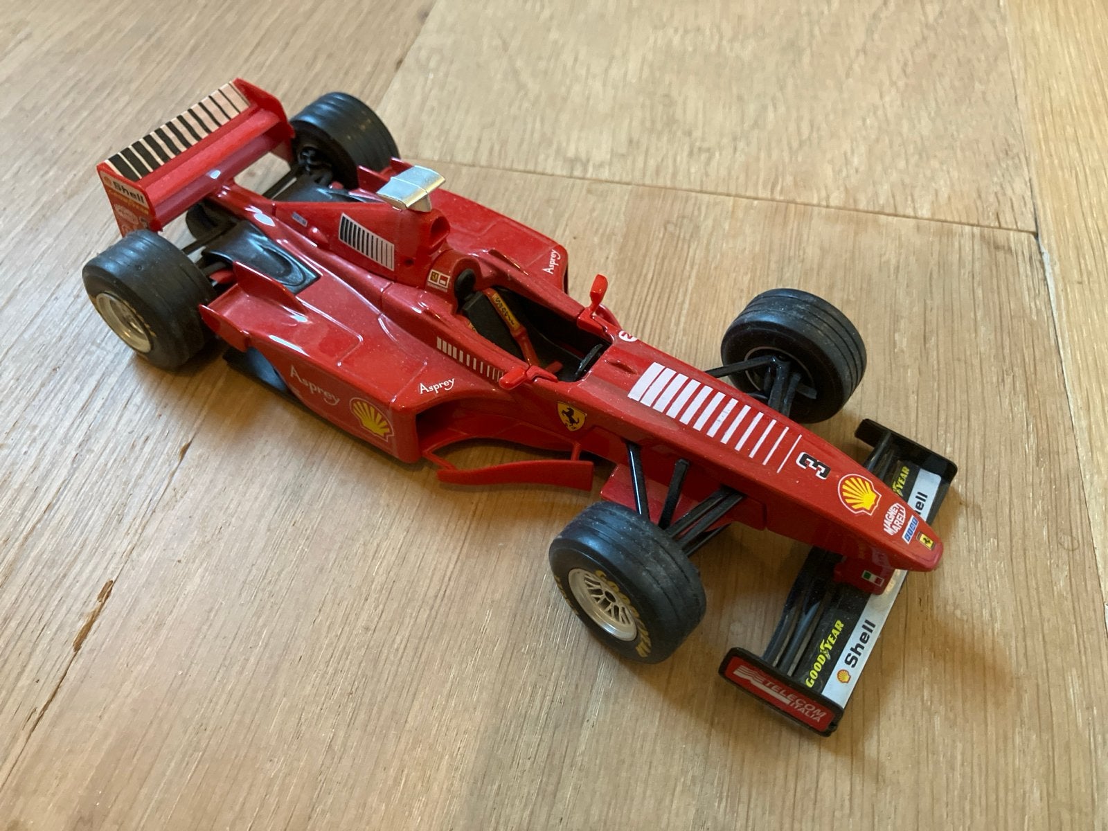 Bburago Ferrari F300 Formule 1 modelauto 1:24, Ophalen of Verzenden, Zo goed als nieuw, Auto, Bburago