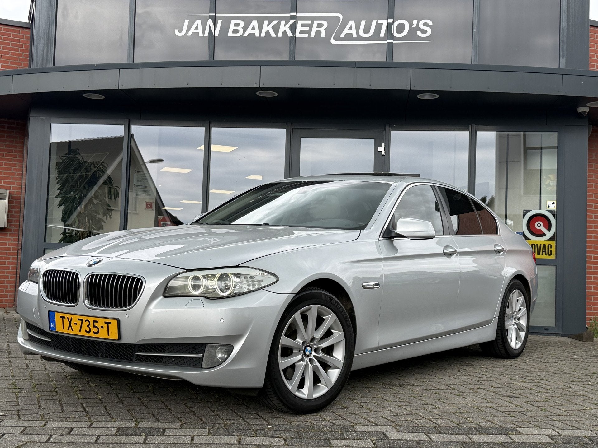 BMW 5 Serie 523i High Executive  Camera  Leer  Schu, Auto's, Achterwielaandrijving, Gebruikt, Beige, Parkeersensor
