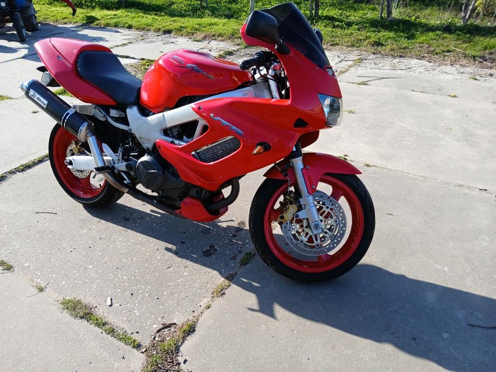 Te koop honda firestorm vtr 1000, Motoren, Motoren | Honda, Particulier, Super Sport, meer dan 35 kW, 4 cilinders, Sportuitlaat