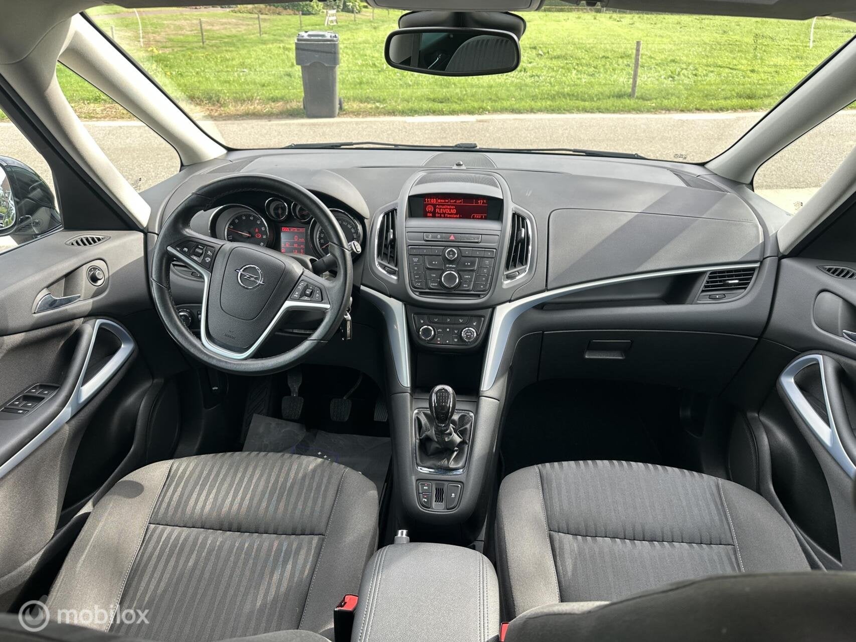 Opel Zafira Tourer 1.4 Design Edition 7-personen Trekhaak✅, Auto's, Voorwielaandrijving, Dealer onderhouden, Stof, 4 cilinders