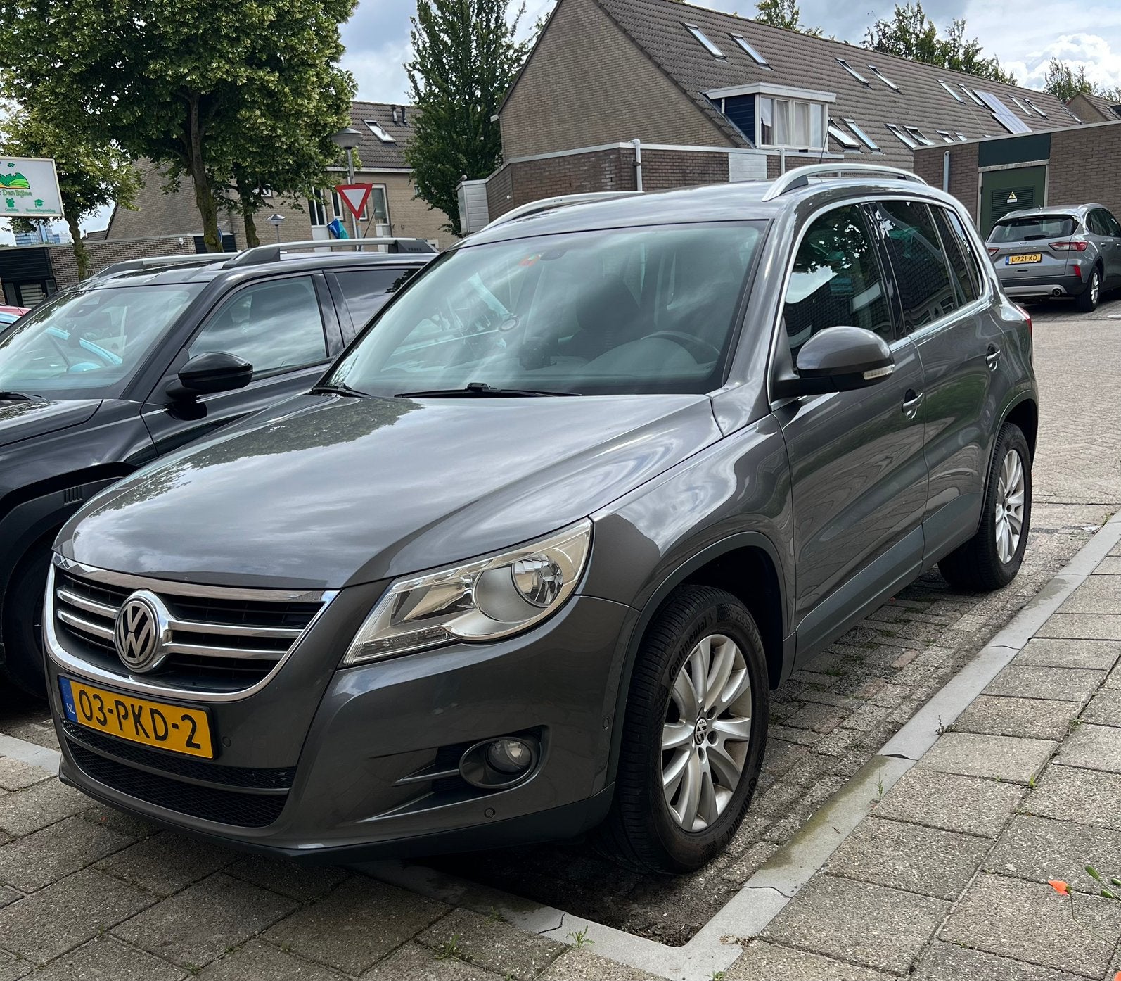 Volkswagen Tiguan 1.4 TSI 90KW BMT 2011 Grijs, Auto's, Voorwielaandrijving, 4 cilinders, 122 pk, Origineel Nederlands
