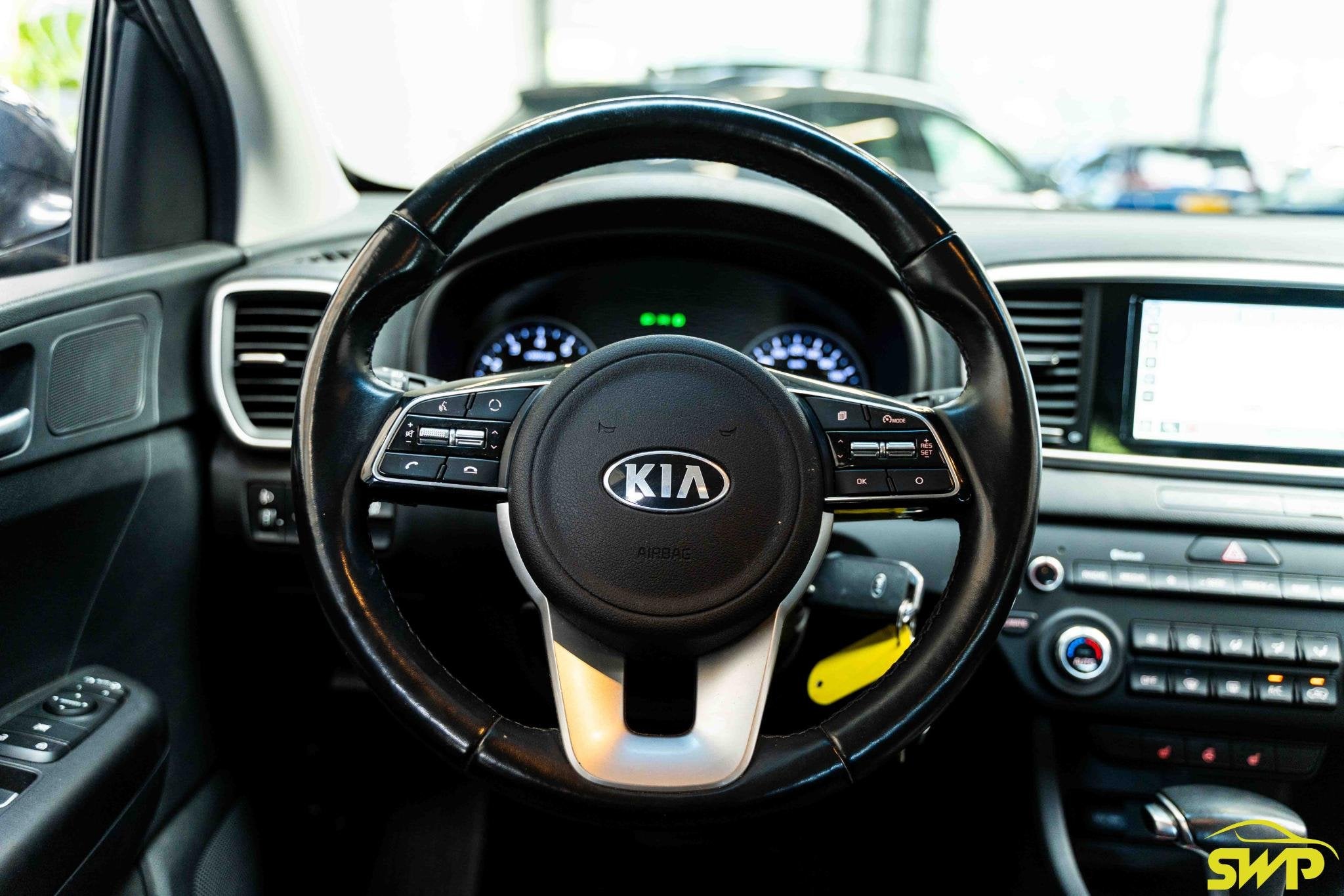 Kia Sportage 1.6 T-GDI 4WD DynamicLine | Navi | Trekhaak | C, Auto's, Stof, Gebruikt, Vierwielaandrijving, Parkeersensor