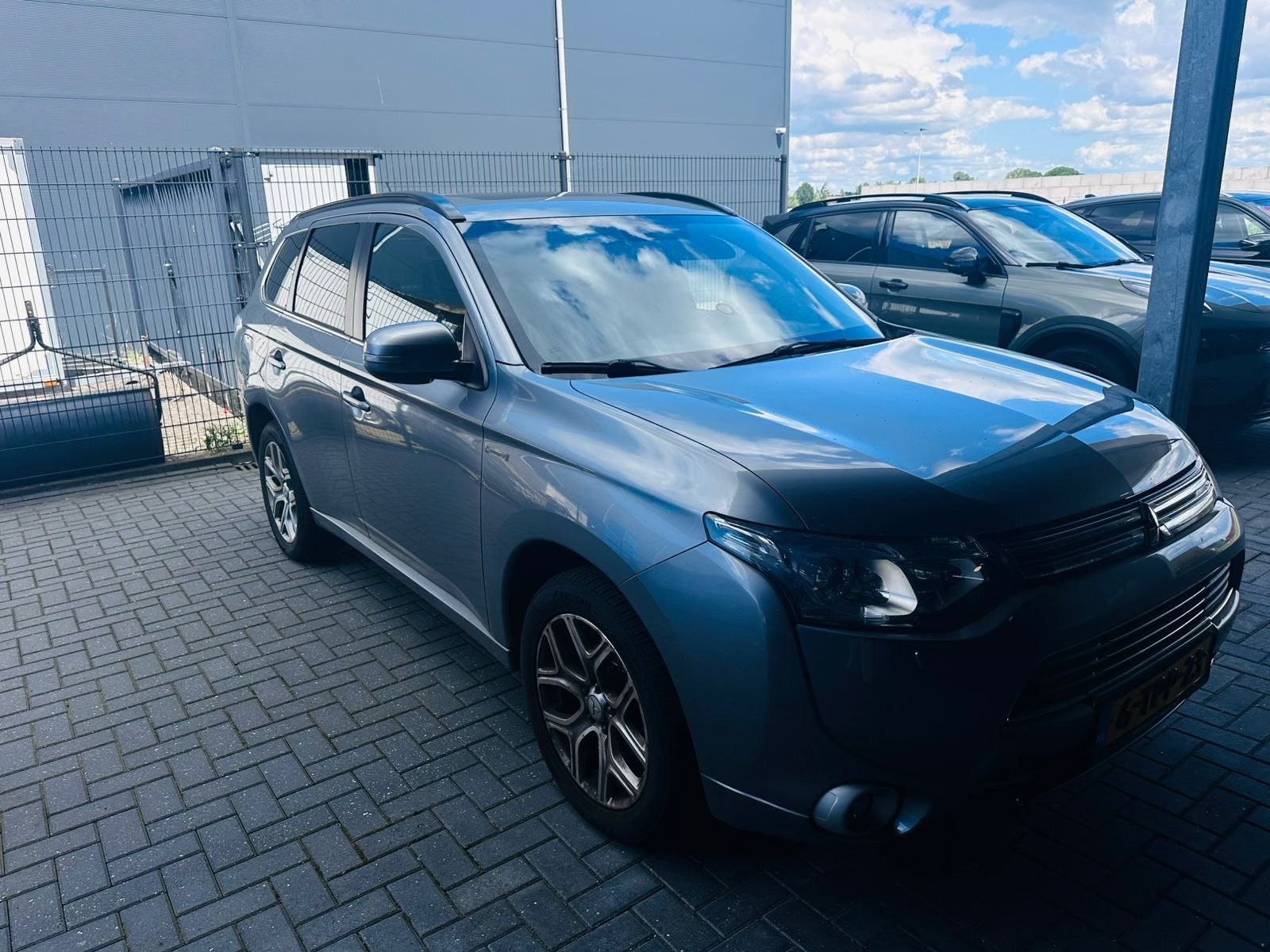 Mitsubishi Outlander 2.0 Dohc Mivec Phev 203pk 4WD CVT 5P, Auto's, 1998 cc, Outlander, 4 cilinders, Bedrijf