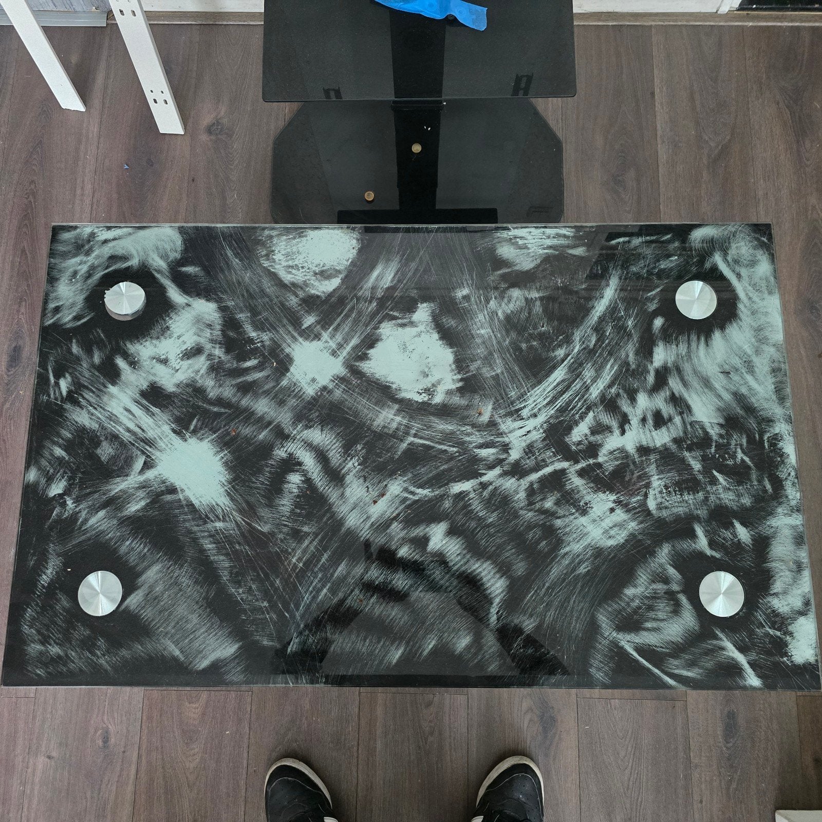 Glazen salontafel met metalen poten, Ophalen, Gebruikt, 100 tot 150 cm, 50 tot 100 cm