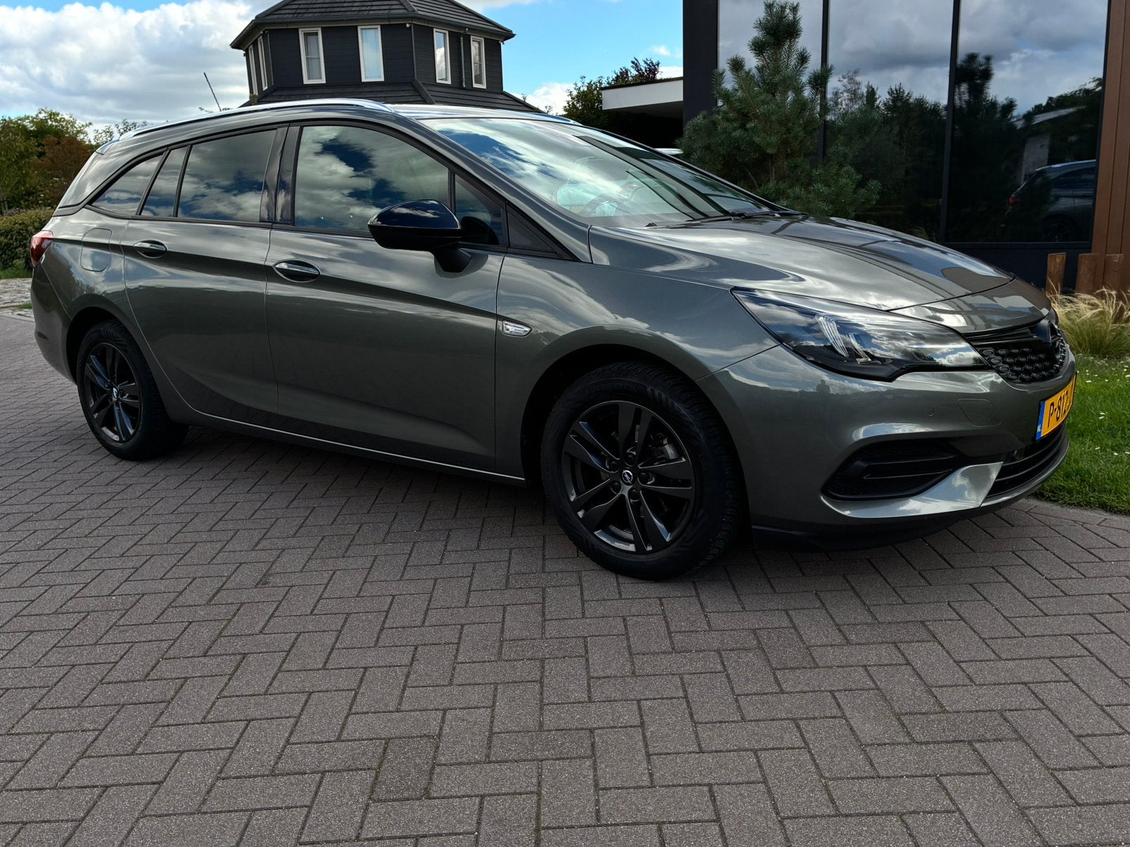 Opel Astra 1.2 Turbo 110pk Black Edition Bj 2020 Cosmic grey, Auto's, Voorwielaandrijving, Stof, Stationwagon, Handgeschakeld