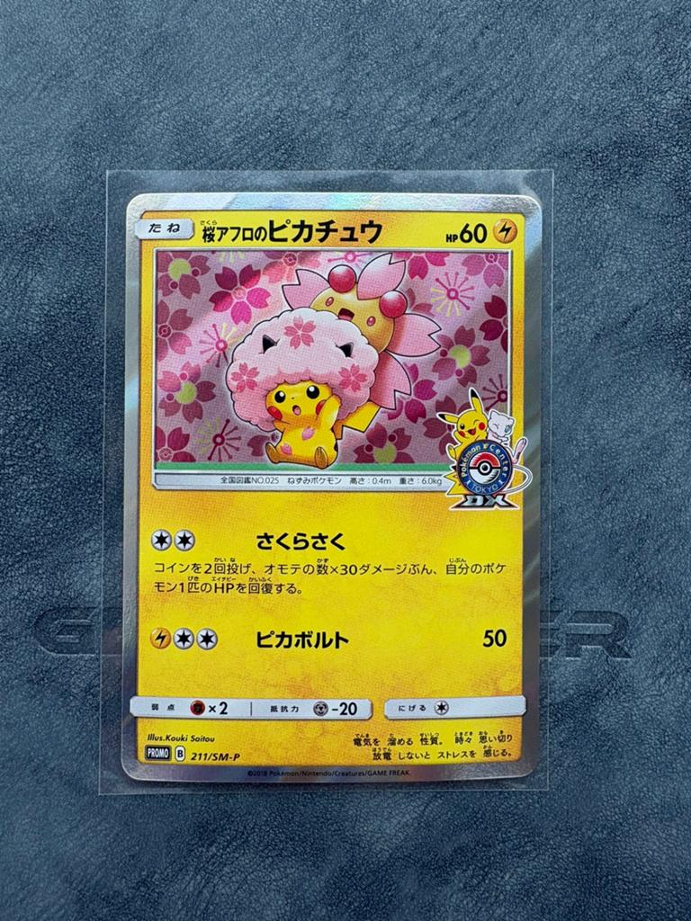 Cherry Blossom Afro Pikachu (SM-P 211) Near Mint No Defects, Ophalen of Verzenden, Zo goed als nieuw, Booster