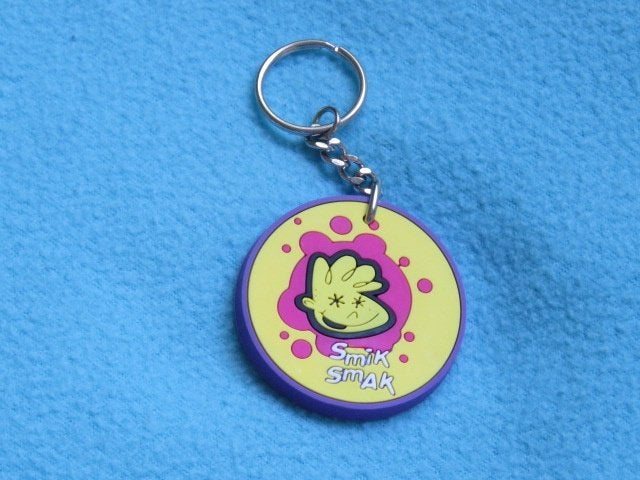 1 EURO OF GRATIS Nieuwe sleutelhanger Smik Smak, Ophalen, Nieuw, Merk