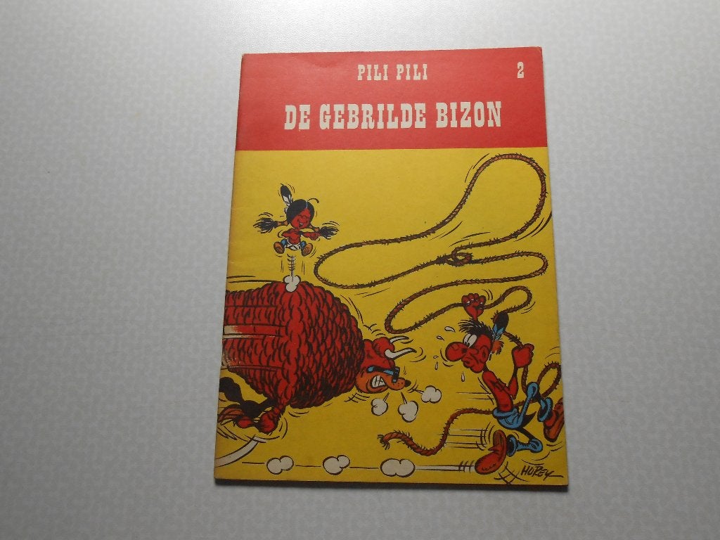 Pili - pili 2 De gebrilde bizon 1973. 1 ste druk., Gelezen, Hurey, Eén stripboek, Ophalen of Verzenden