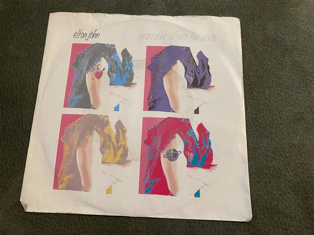 Elton John heartache all over the world singles [751]