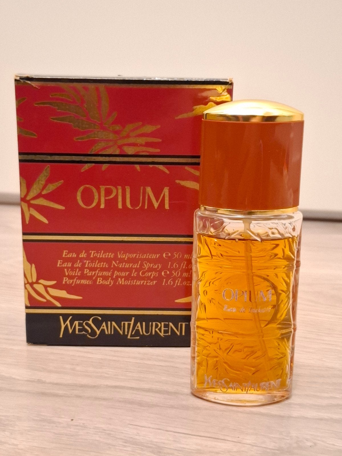 yves saint laurent Opium eau de toilette 50ML, Ophalen of Verzenden, Zo goed als nieuw, Parfumfles, Gevuld
