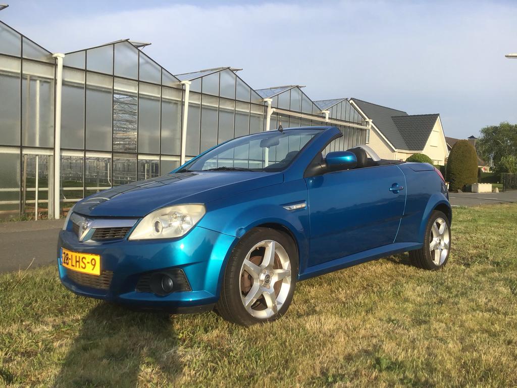 Opel Tigra 1.4 16V Twintop 2005 Blauw, Auto's, Opel, Voorwielaandrijving, 4 cilinders, Cabriolet, Blauw