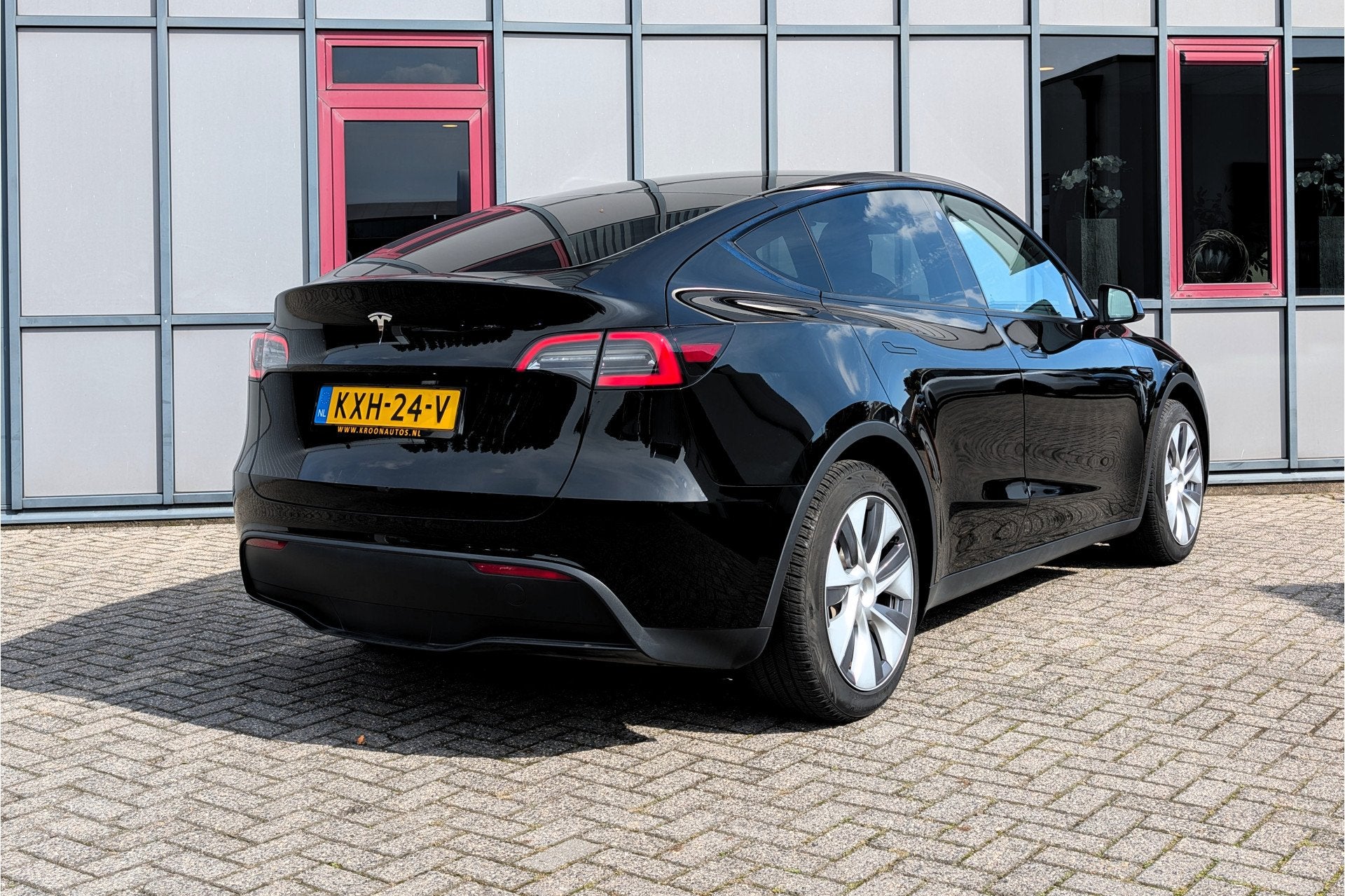 Tesla Model Y RWD 58kWh LFP Warmtepomp (bj 2024, automaat), Auto's, Automaat, Dealer onderhouden, Achterwielaandrijving, Gebruikt