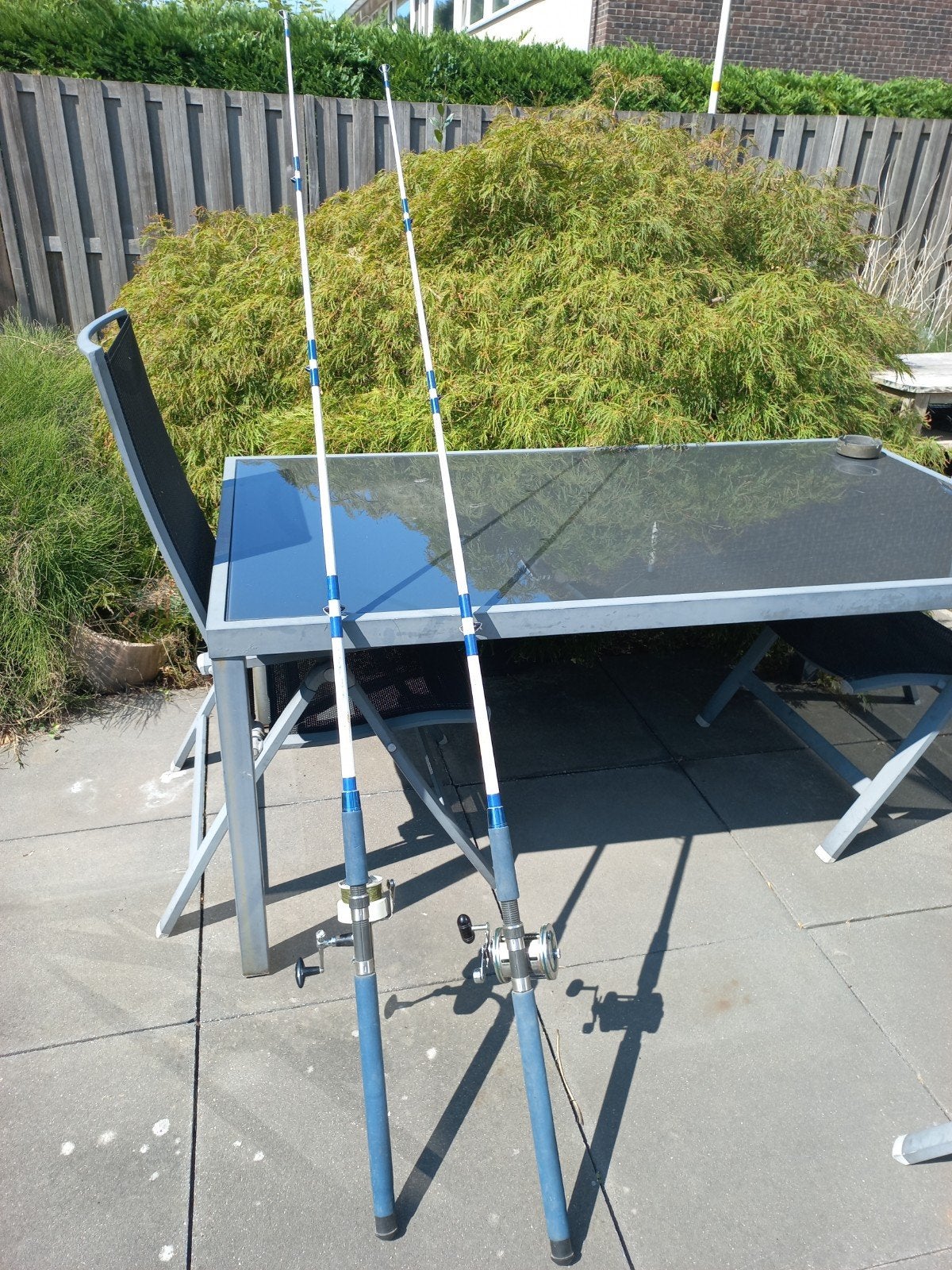Twee boothengels met reel en molen., Watersport en Boten, Hengelsport | Zeevissen, Ophalen, Complete set