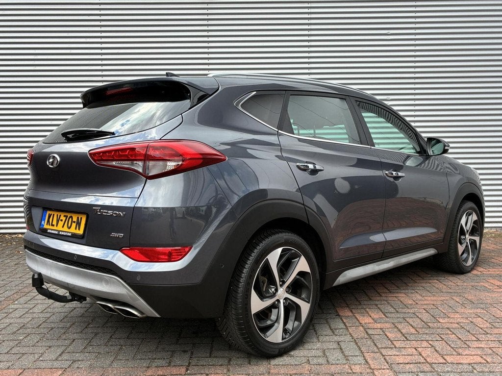 Hyundai Tucson 1.6 T-GDi Comfort 4WD Autom Led Cruise Leer C, Auto's, Hyundai, Gebruikt, 4 cilinders, Bedrijf, Vierwielaandrijving