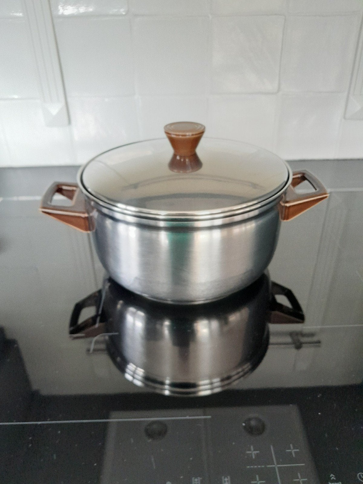 pan kan niet op inductie., Ophalen