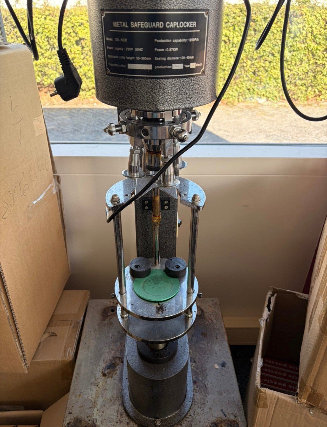 Pilfer proof caps machine, Ophalen
