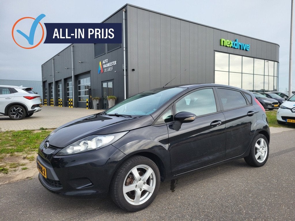 Ford Fiesta 1.25 16V 60 pk Limited Airco Trekhaak nieuwe dis, Keurmerk '100% Onderhouden', Verwarmde buitenspiegels, 1242 cc, 4 cilinders