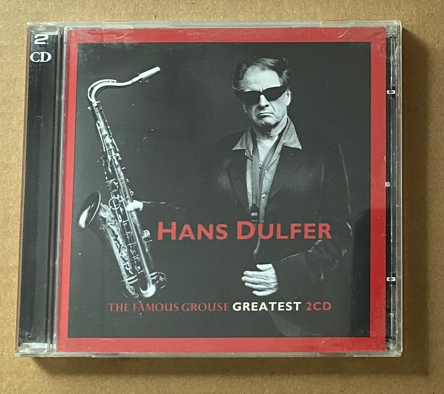 2CD HANS DULFER - The Famous Grouse Greatest (zgan), Verzenden, Zo goed als nieuw, Jazz, Inclusief boekje