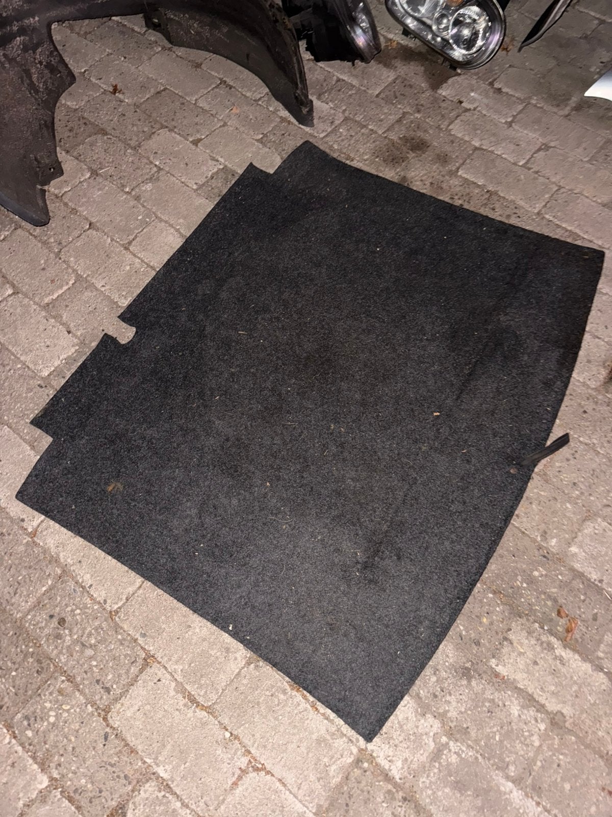 Kofferbak mat golf 4, Ophalen
