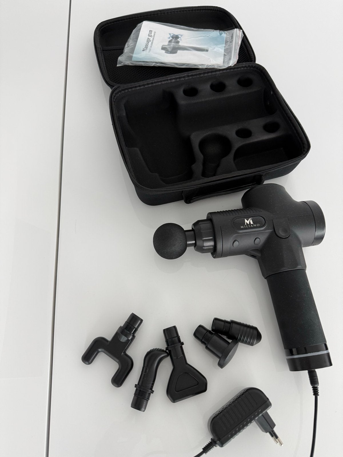 Miliano Massage Gun met Opzetstukken en Oplader, Ophalen of Verzenden, Zo goed als nieuw, Apparaat
