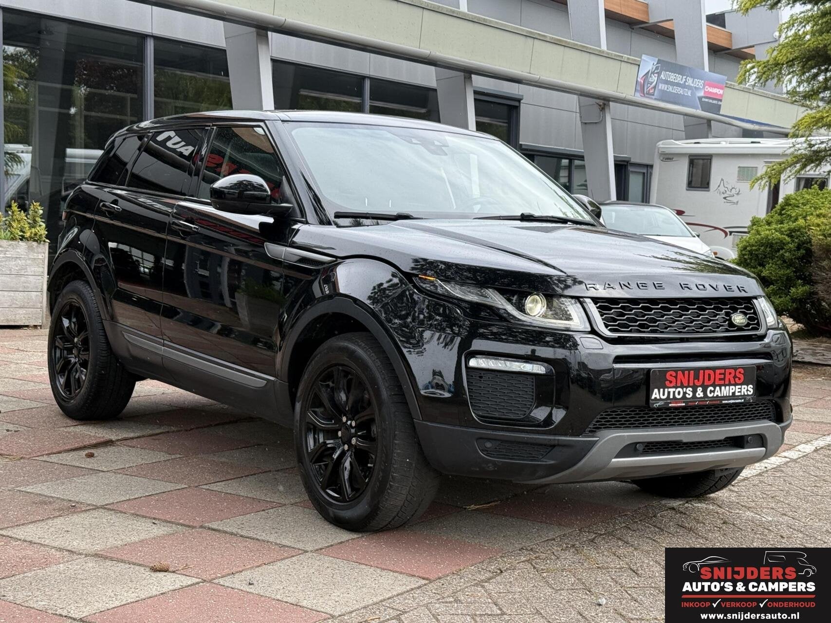 Land Rover Range Rover Evoque 2.0 Si4 met maar 61129 km, Auto's, Automaat, Gebruikt, Zwart, 4 cilinders
