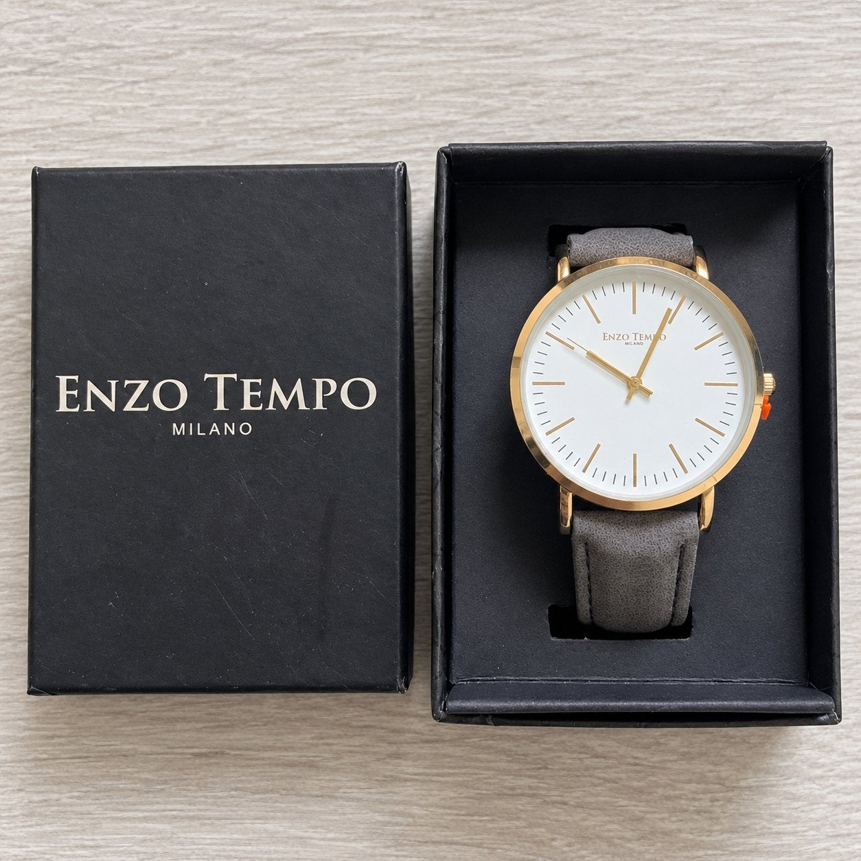 Enzo Tempo Milano horloge goudkleur met grijze band in doos, Ophalen of Verzenden, Nieuw, Polshorloge, Overige merken