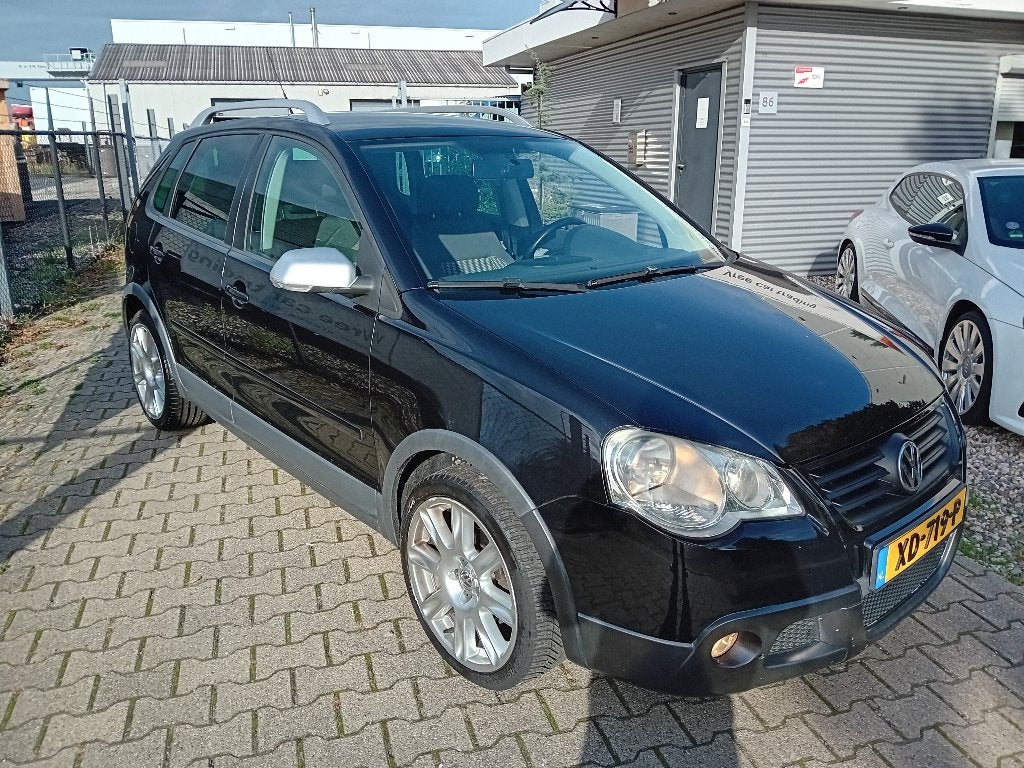 Volkswagen Polo 1.4 16V 59KW Cross 2006 Zwart NETTE AUTO!!, Auto's, Voorwielaandrijving, Dealer onderhouden, Zwart, Bedrijf