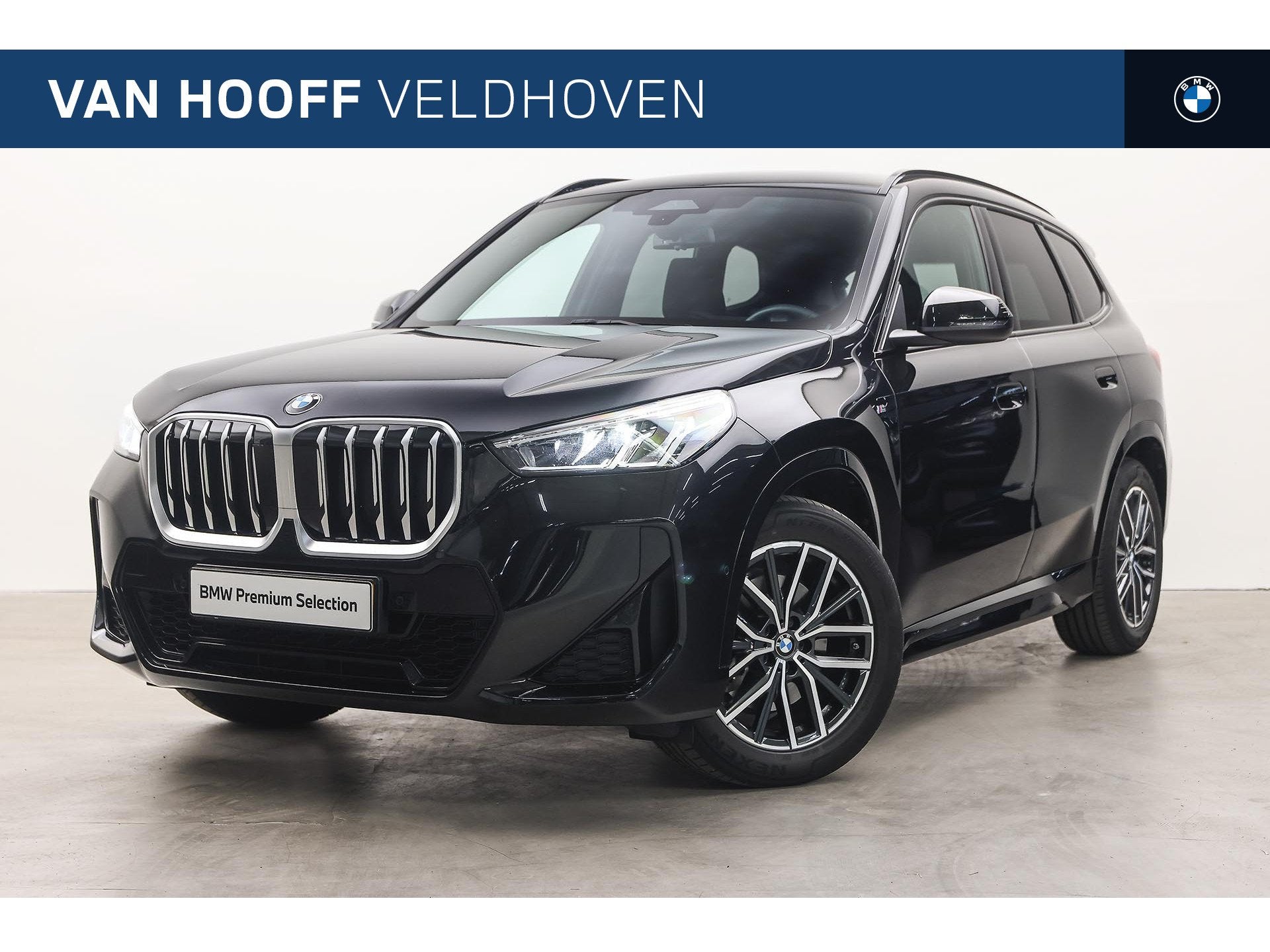 BMW X1 sDrive20i M Sport Automaat / Trekhaak / Achteruitrijc, 1525 kg, 156 pk, Met garantie (alle), Zwart