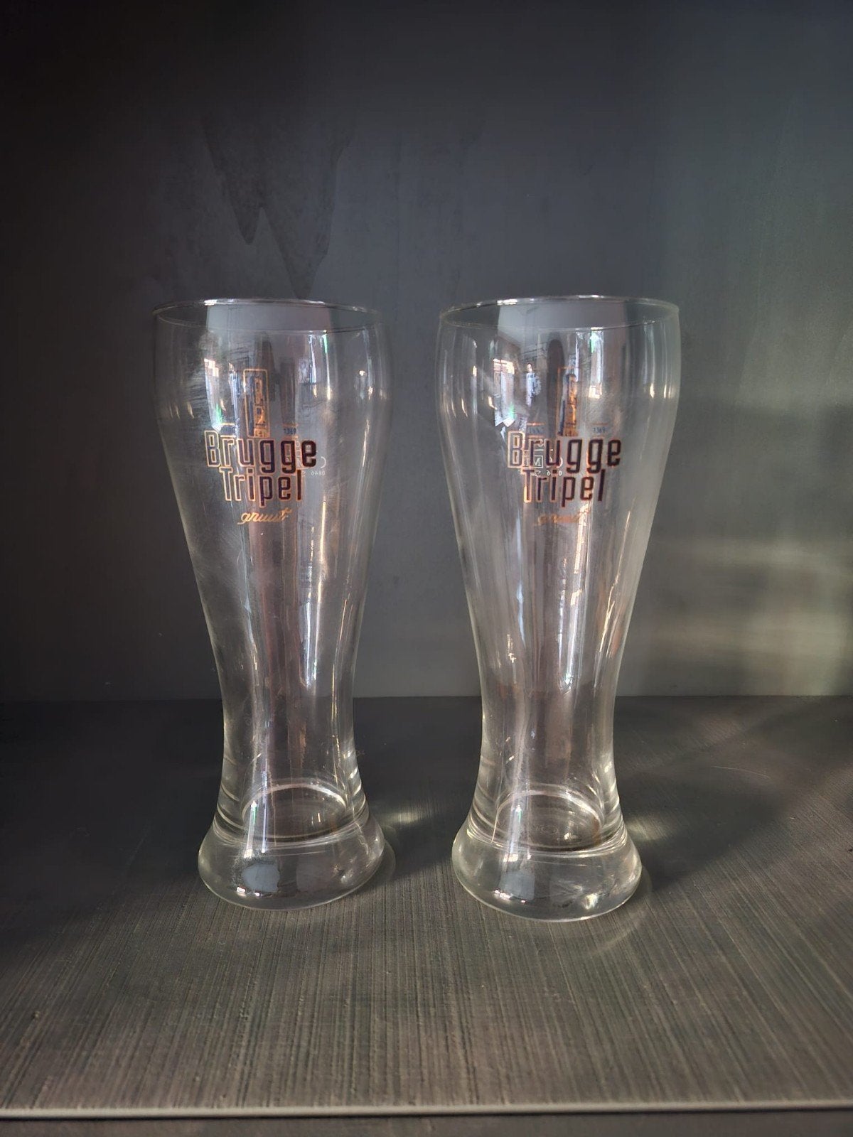 Brugge tripel bierglazen (2 stuks), Ophalen of Verzenden, Zo goed als nieuw, Bierglas