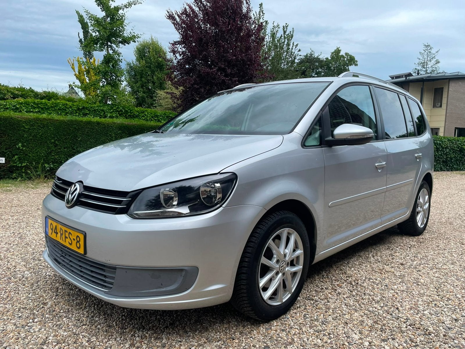 Volkswagen Touran 1.2 TSI 77KW BMT 7P 2011 Grijs, Auto's, Volkswagen, Voorwielaandrijving, 4 cilinders, 7 stoelen, Origineel Nederlands
