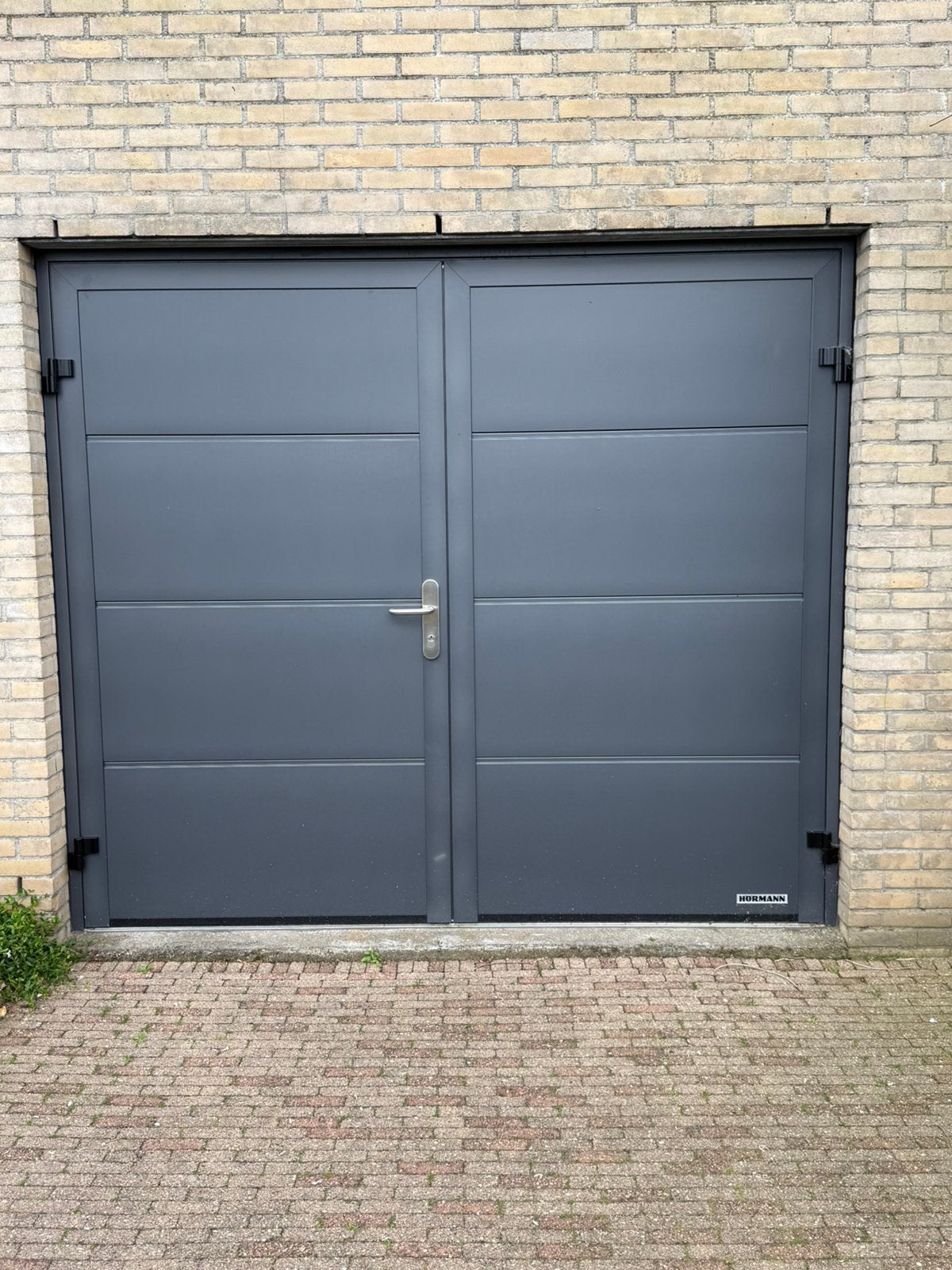 Hörmann garagedeur, Ophalen, Garagedeur, Zo goed als nieuw, 120 cm of meer