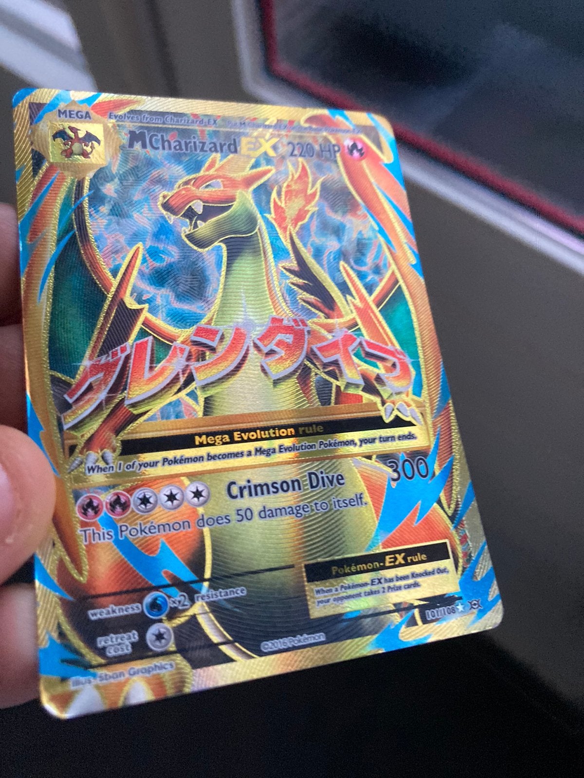 Pokemon M charizard EX 101 xy, Ophalen of Verzenden, Zo goed als nieuw