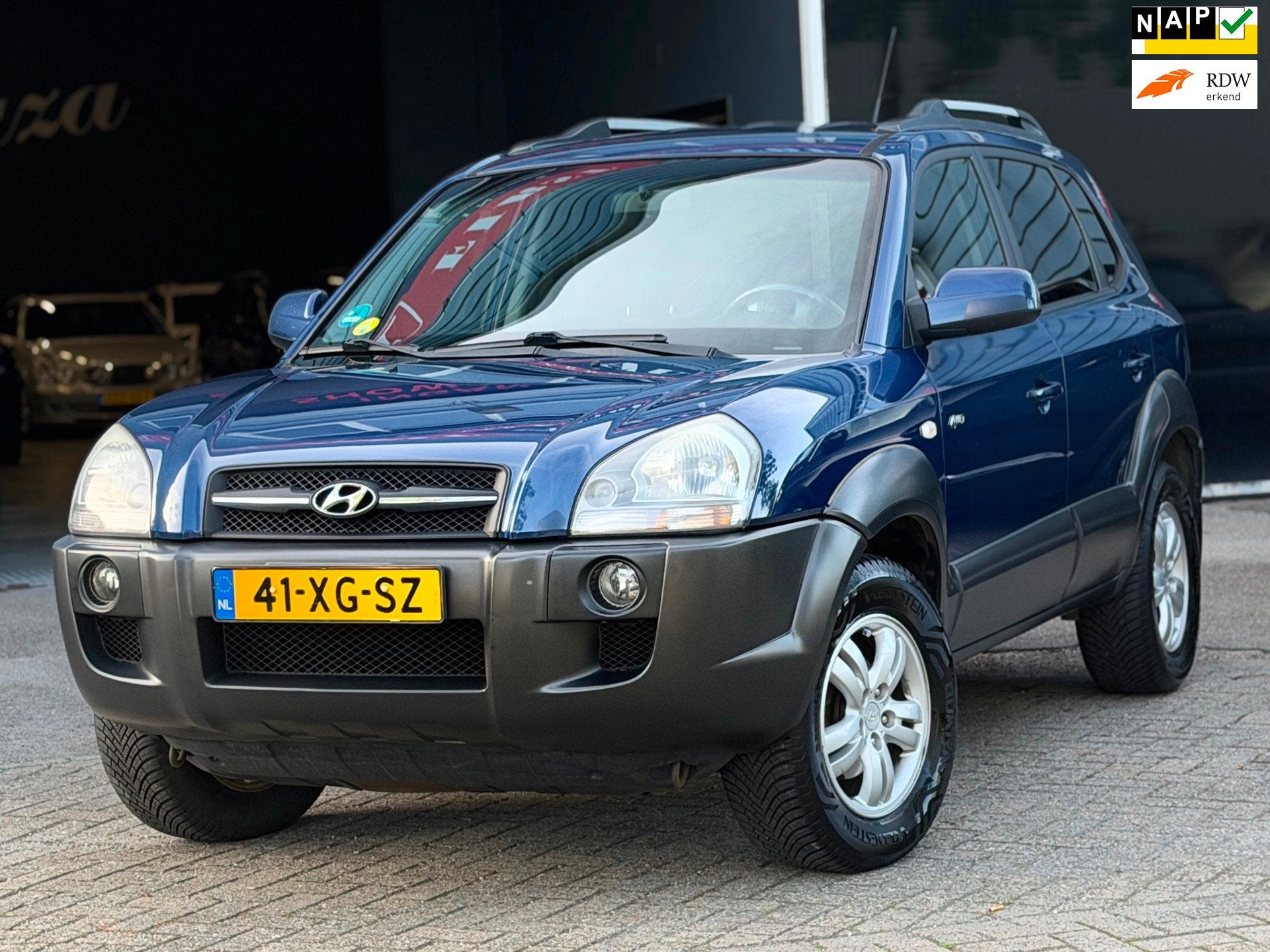 Hyundai Tucson 2.0i 4WD Style AIRCO/CRUISE/TREKHAAK | INRUIL, Auto's, Automatische klimaatregeling, Stof, Gebruikt, 4 cilinders