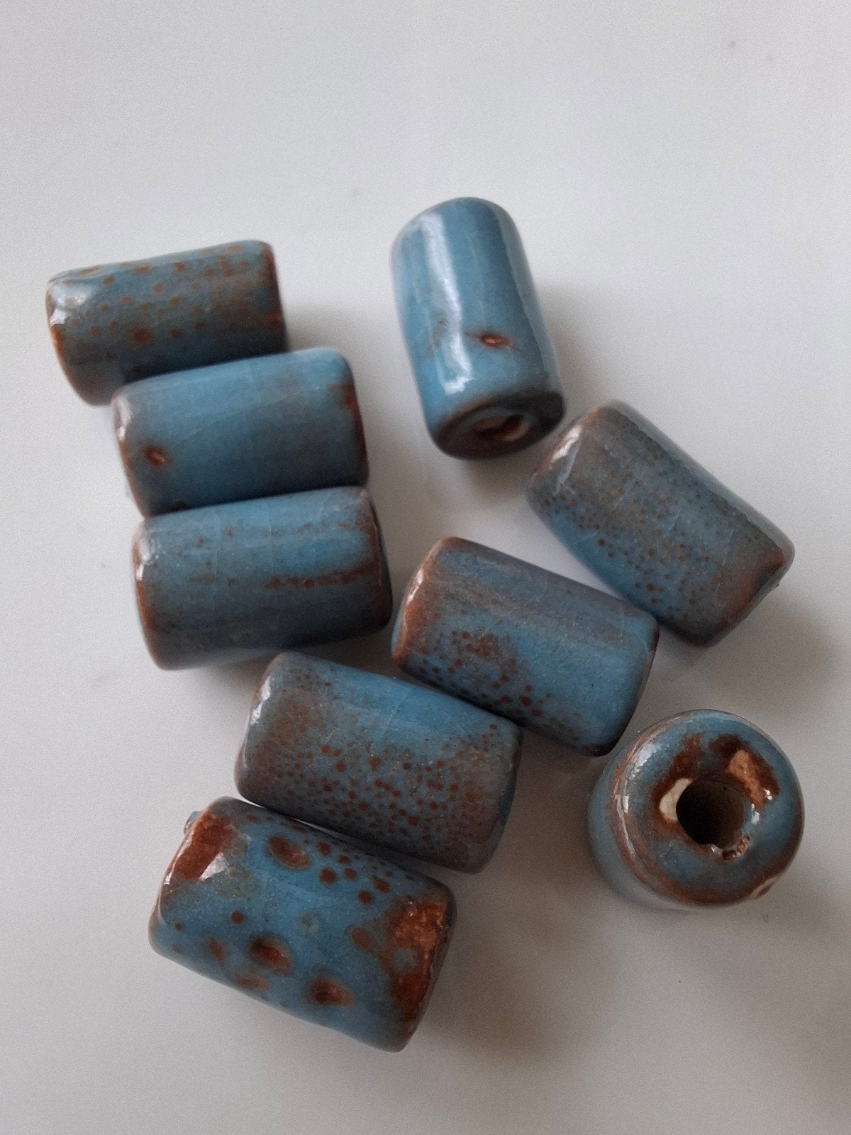 9 stuks keramiek glaskralen bruin blauw kralen, Kraal, -, -, Ophalen of Verzenden