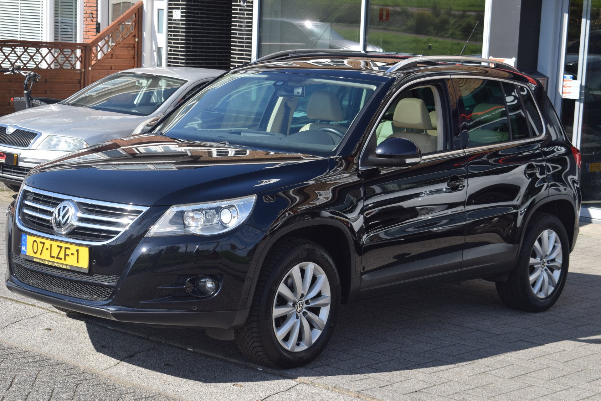 Volkswagen Tiguan 1.4 TSI Sport&Style PANODAK/LEER/PDC/NAVI, Auto's, Voorwielaandrijving, Euro 5, 15 km/l, Beige