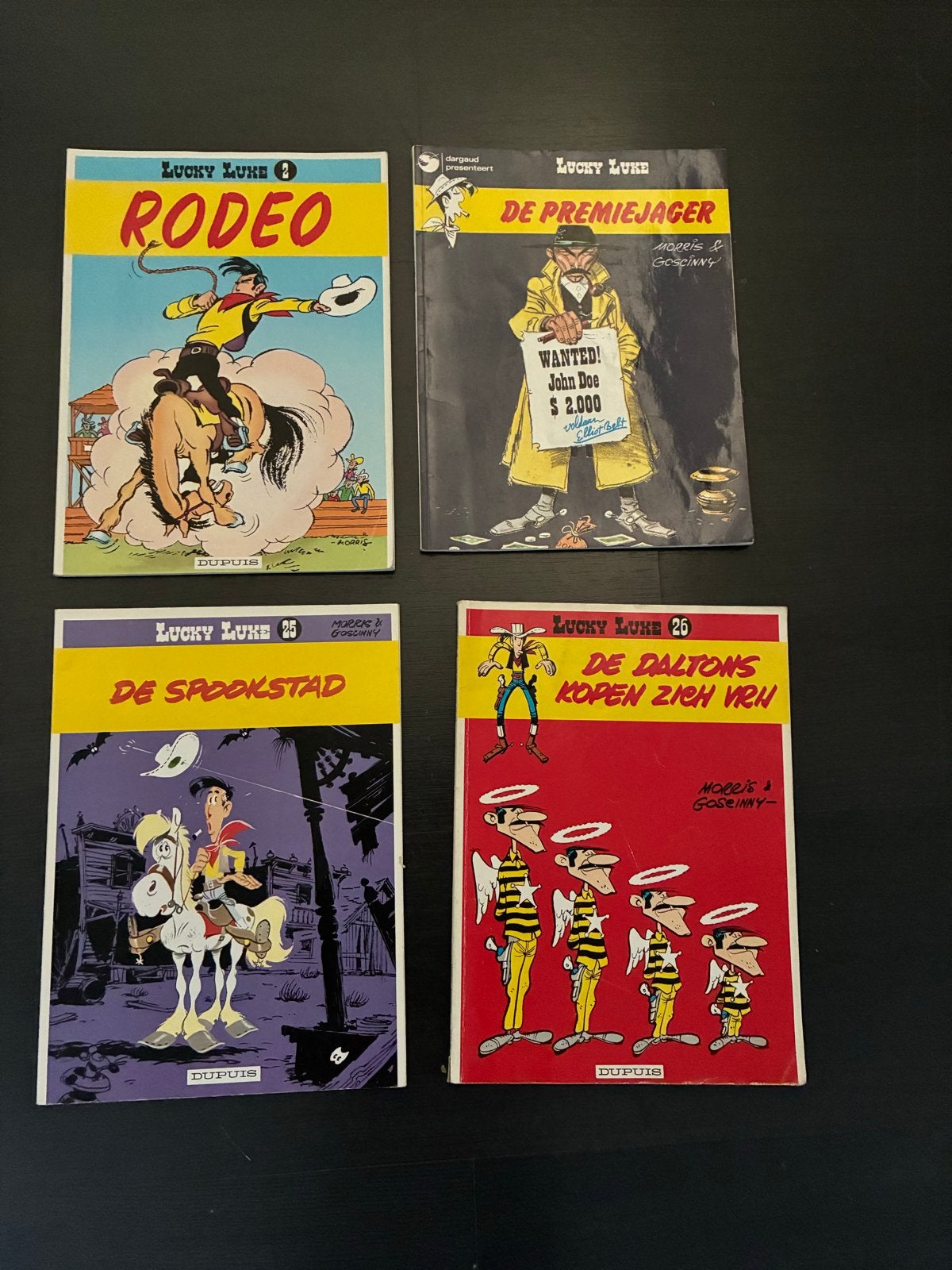 Lucky Luke Stripboeken: Rodeo, De Premiejager, De Spookstad,, Meerdere stripboeken, Ophalen of Verzenden, Gelezen