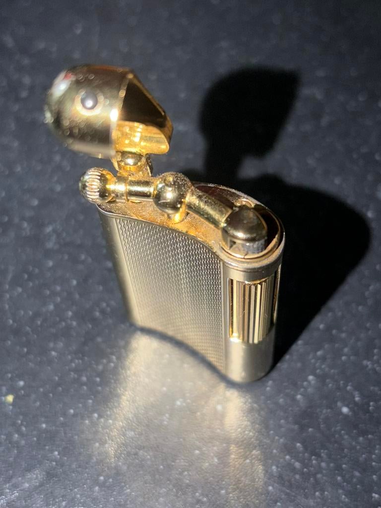 Goud kleurg aansteker van merk sarome japan, Verzamelen, Ophalen of Verzenden, Zo goed als nieuw, Aansteker