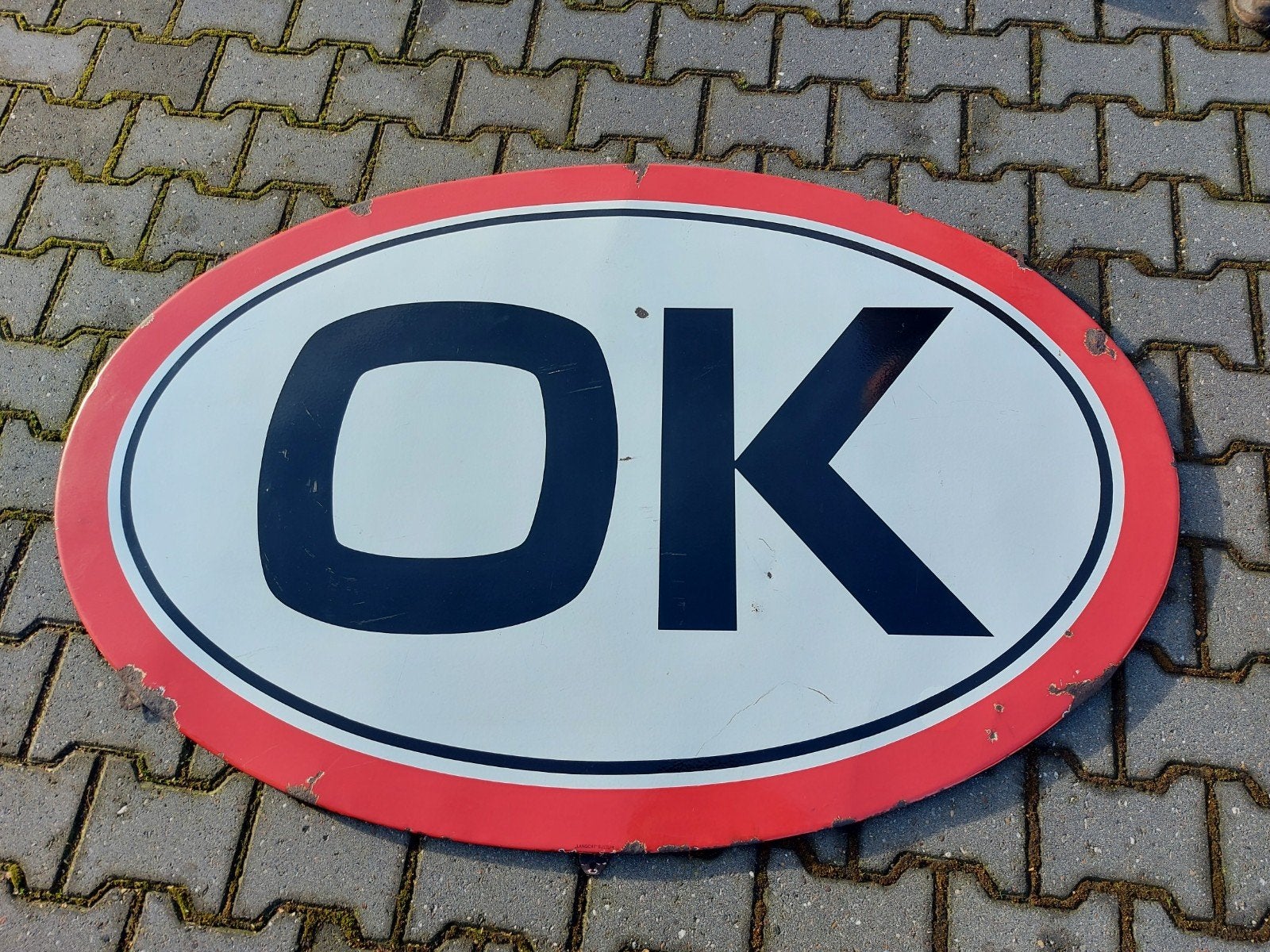 OK Olie emaille bord - Langcat Bussum, Ophalen