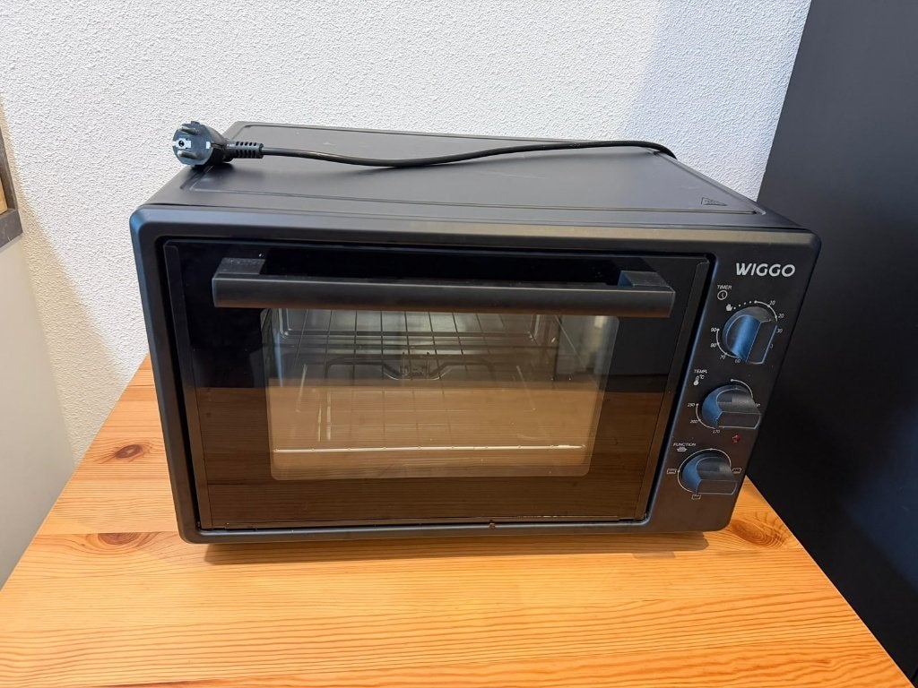 WIGGO black mini oven, 35L. 1800WC, Ophalen, Minder dan 45 cm, Overige merken, Zo goed als nieuw