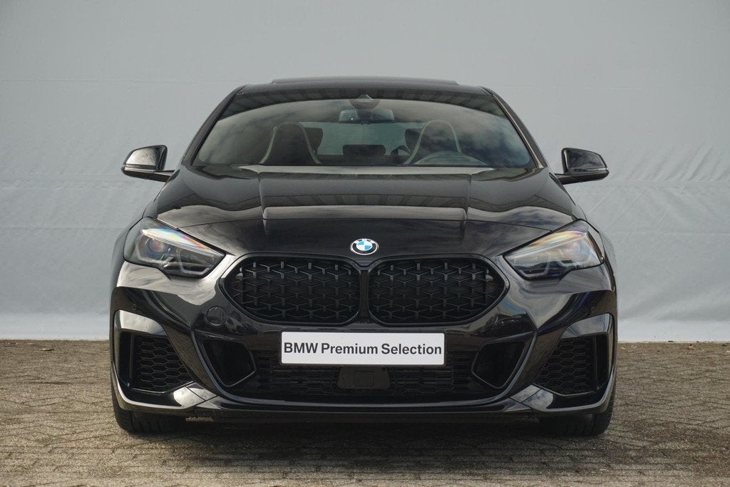BMW 2 Serie Gran Coupé M235i xDrive | Panoramadak / Head-up, Auto's, BMW, 1998 cc, Stof, Met garantie (alle), Zwart