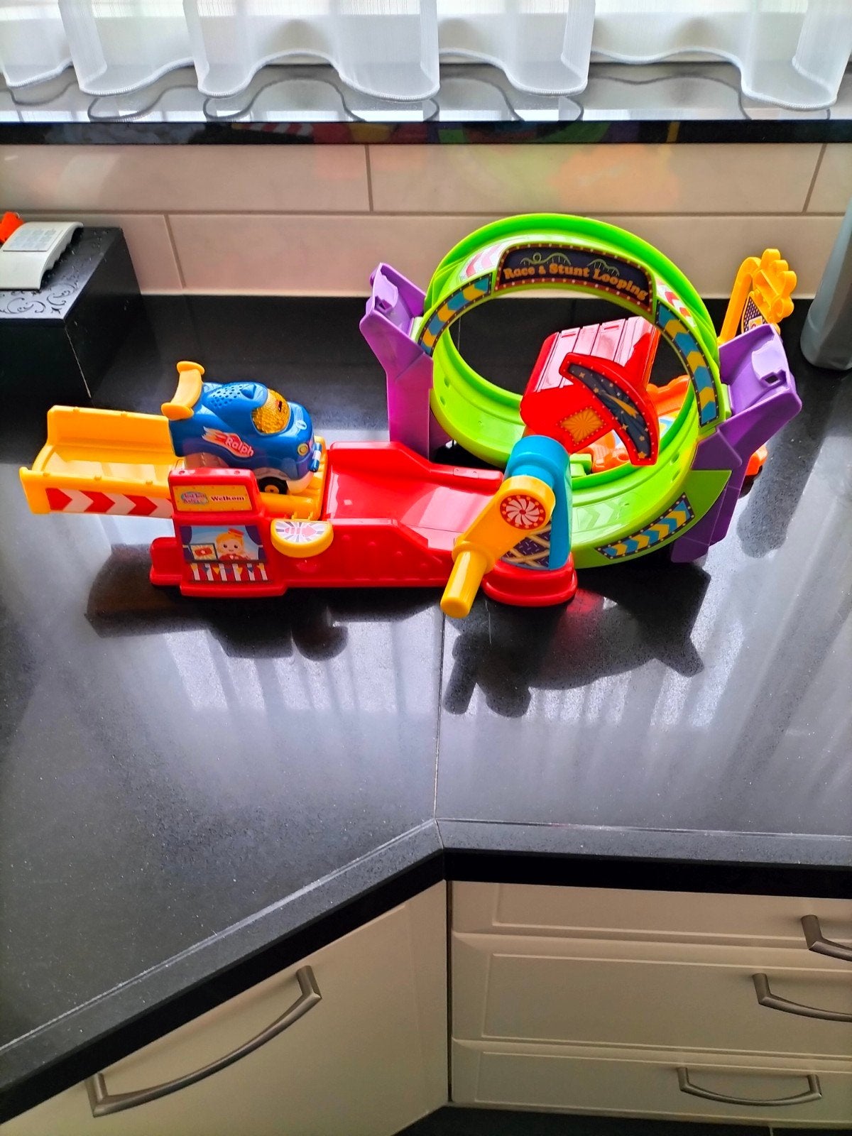 VTech Race & Stunt Looping Racebaan met auto, Ophalen