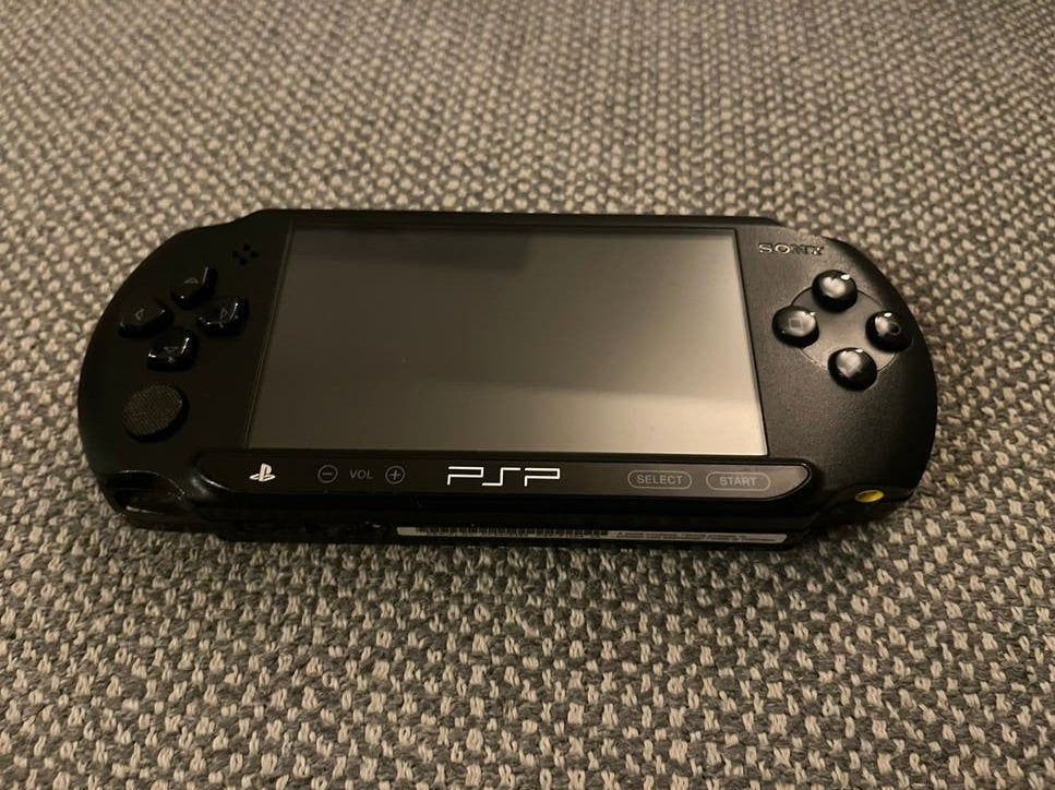Sony PSP-E1004, Ophalen of Verzenden, Gebruikt, Zwart, PSP