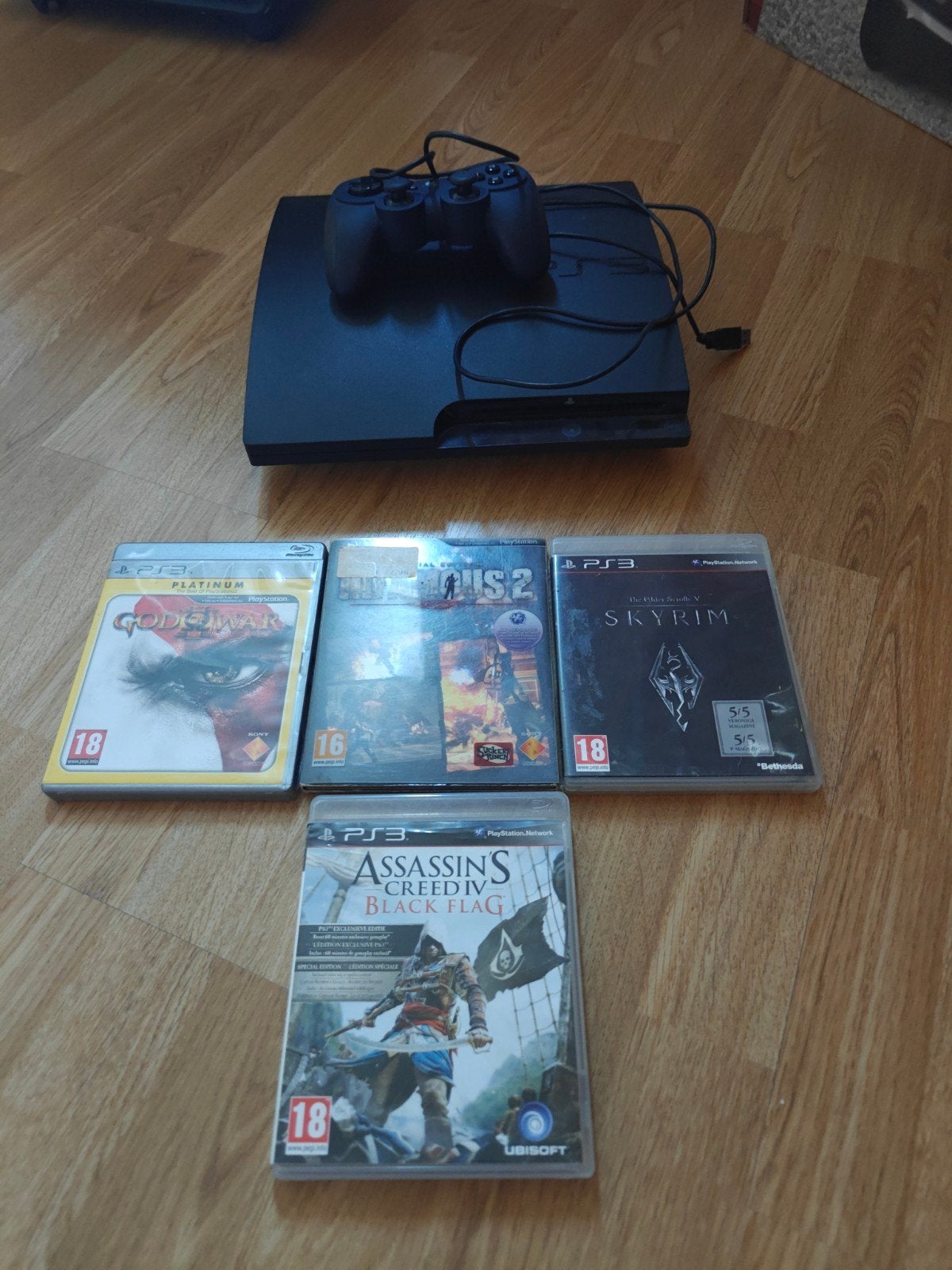 PlayStation 3 met controller en 4 games, Avontuur en Actie, Gebruikt, Vanaf 18 jaar, 1 speler