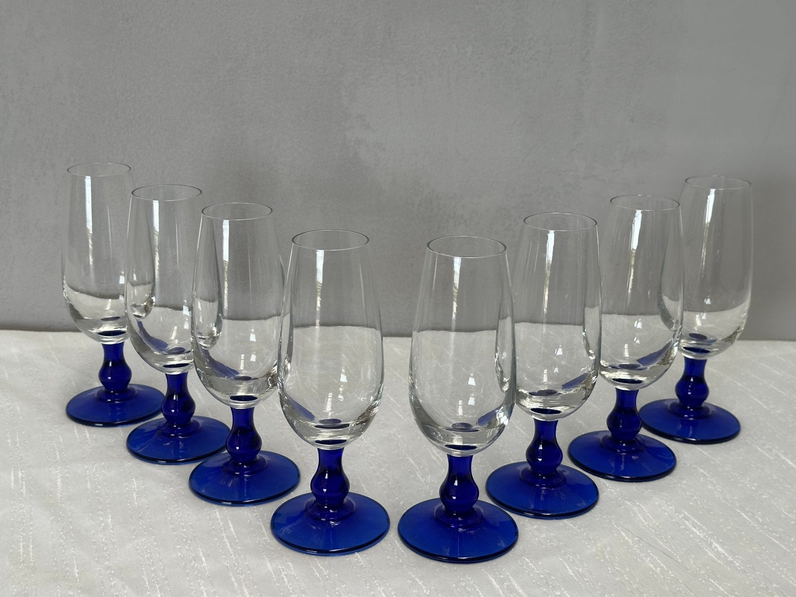 Set/8 vintage champagne glazen met blauwe voet, Ophalen, Gebruikt, X, Glas